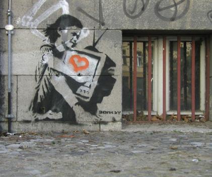 http://www.banksy.co.uk/outdoors/images/landscapes/girl-tv.jpg